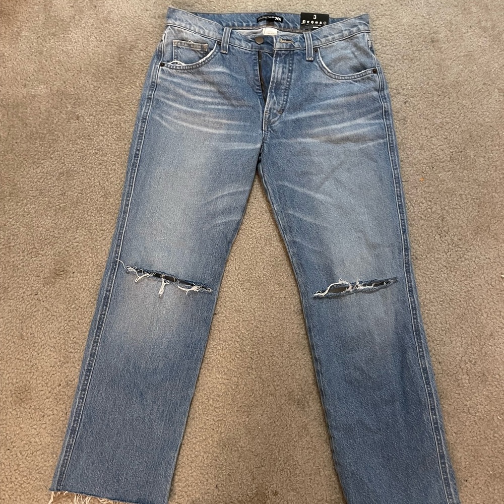 Brand new/never worn jeans with ripped knees from FashionNova. Tags attached